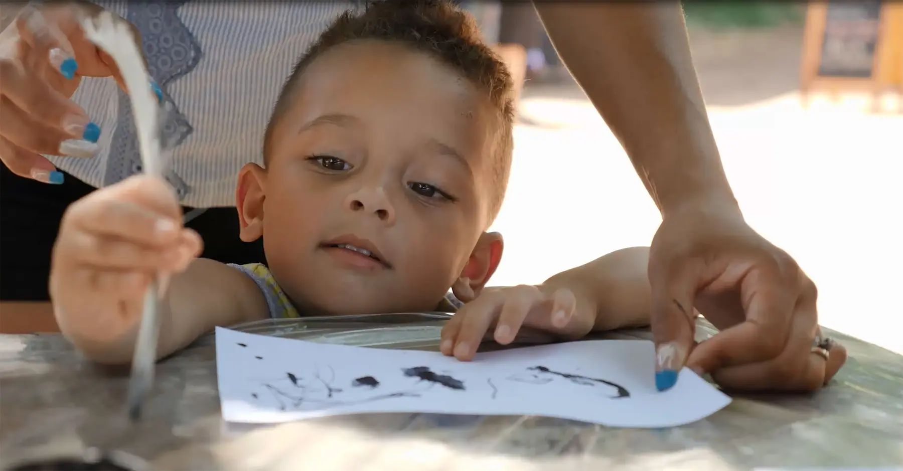 Image of a child drawing at the Mountaintop Activity Center