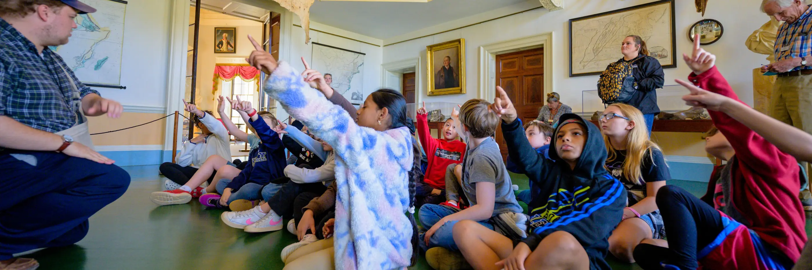 Students participating in a guided school field trip inside Monticello